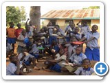 A section of pupils of Ajia primary school enjoying mid- day meal at the school in 2012. This is a very clear evidence of achieving school feeding programme through a parent- led established school garden.